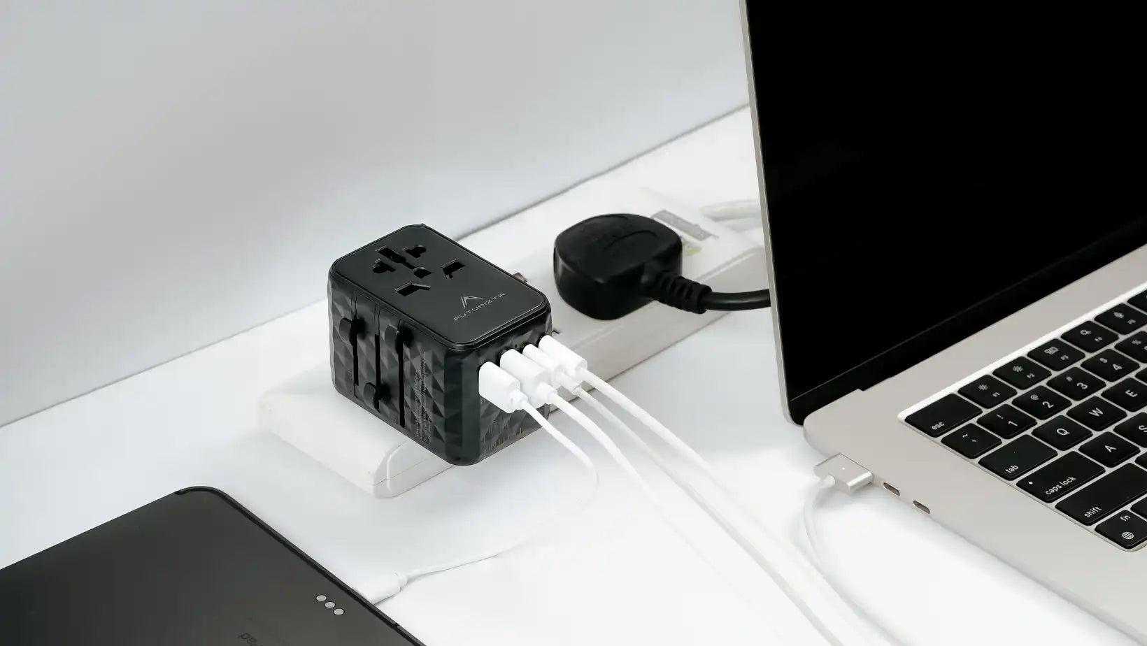 Black universal travel adapter.