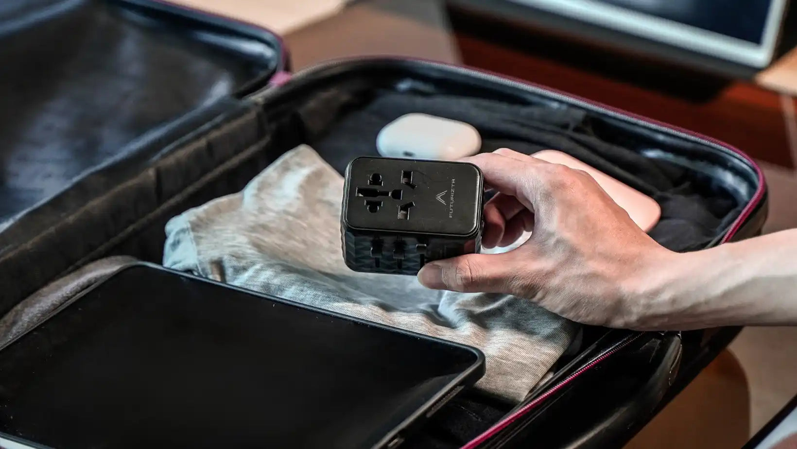 Black universal travel adapter.