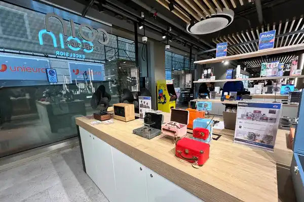 Display of vintage-style radios and accessories.