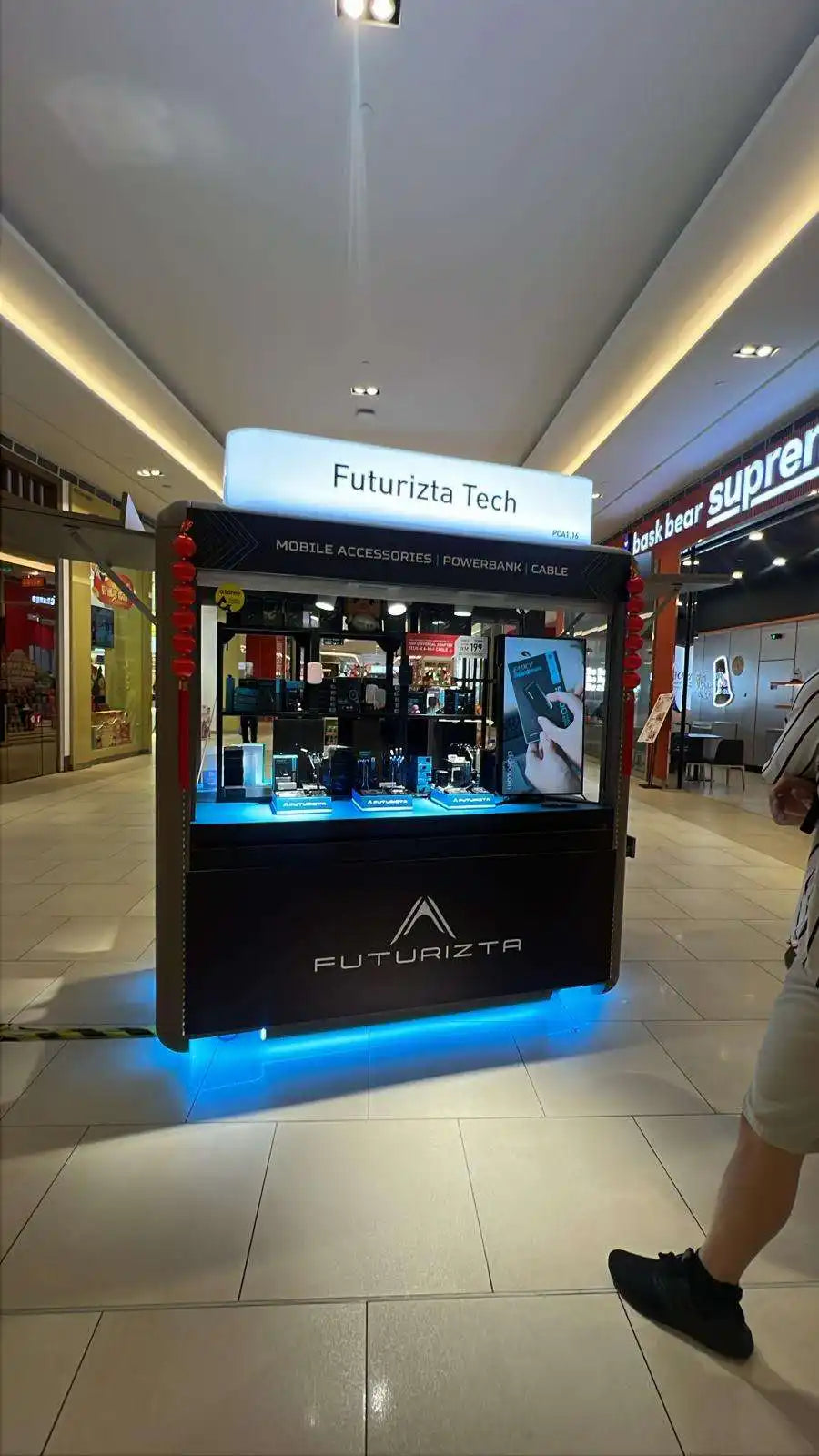 Illuminated mobile accessories kiosk.