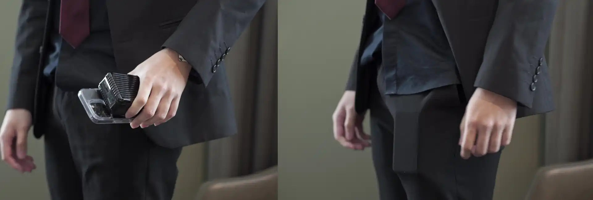 Man in suit holding phone.