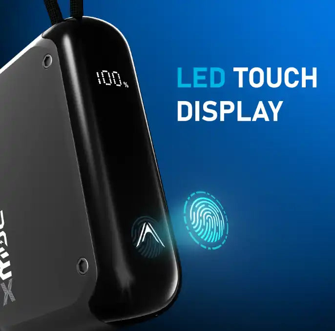 A sleek black portable charger with an LED touch display showing 100% battery and a fingerprint sensor.