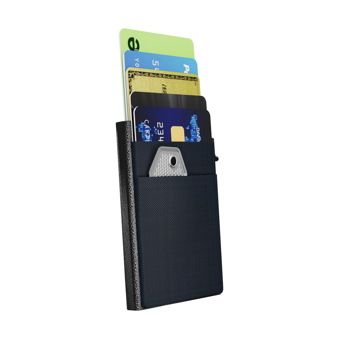 Atlas Xpand holding cards, a key and coin